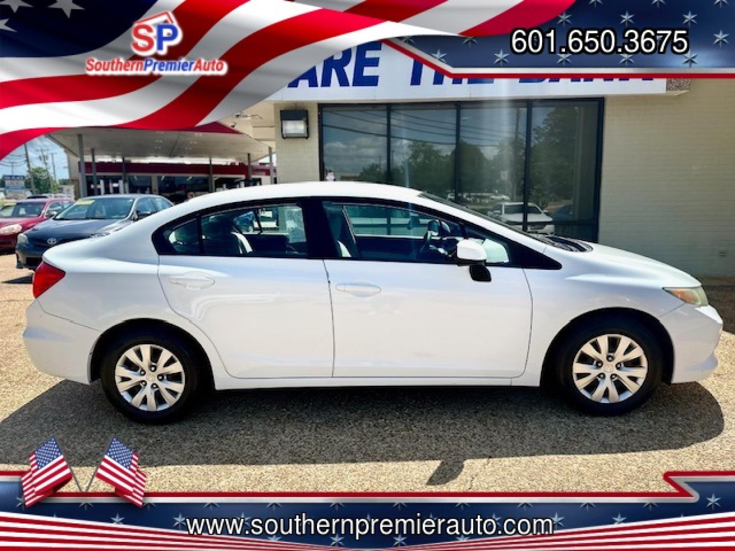 2012 WHITE HONDA CIVIC LX LX (2HGFB2F51CH) with an 1.8L L4 SOHC 16V engine, 5-Speed Automatic transmission, located at 922 W. Beacon St., Philadelphia, MS, 39350, (601) 650-3675, 32.770447, -89.127151 - Title: 2012 Honda Civic LX Sedan Year: 2012 Make: Honda Model: Civic Engine: 1.8L L4 SOHC 16V Body: SEDAN 4-DR Transmission: 5-Speed Automatic Drive Type: FWD Mpg City: 28 Mpg: 39 Trim: LX Sedan - Photo#6